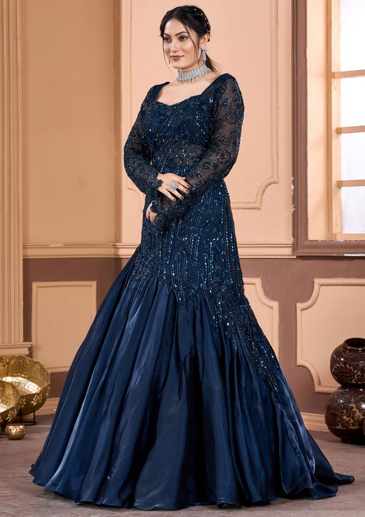 Stunning navy blue satin gown featuring delicate embroidery, ideal for special occasions.