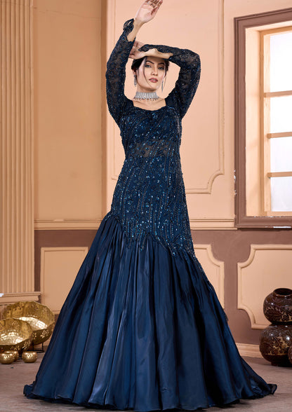 Stunning navy blue satin gown featuring delicate embroidery, ideal for special occasions.