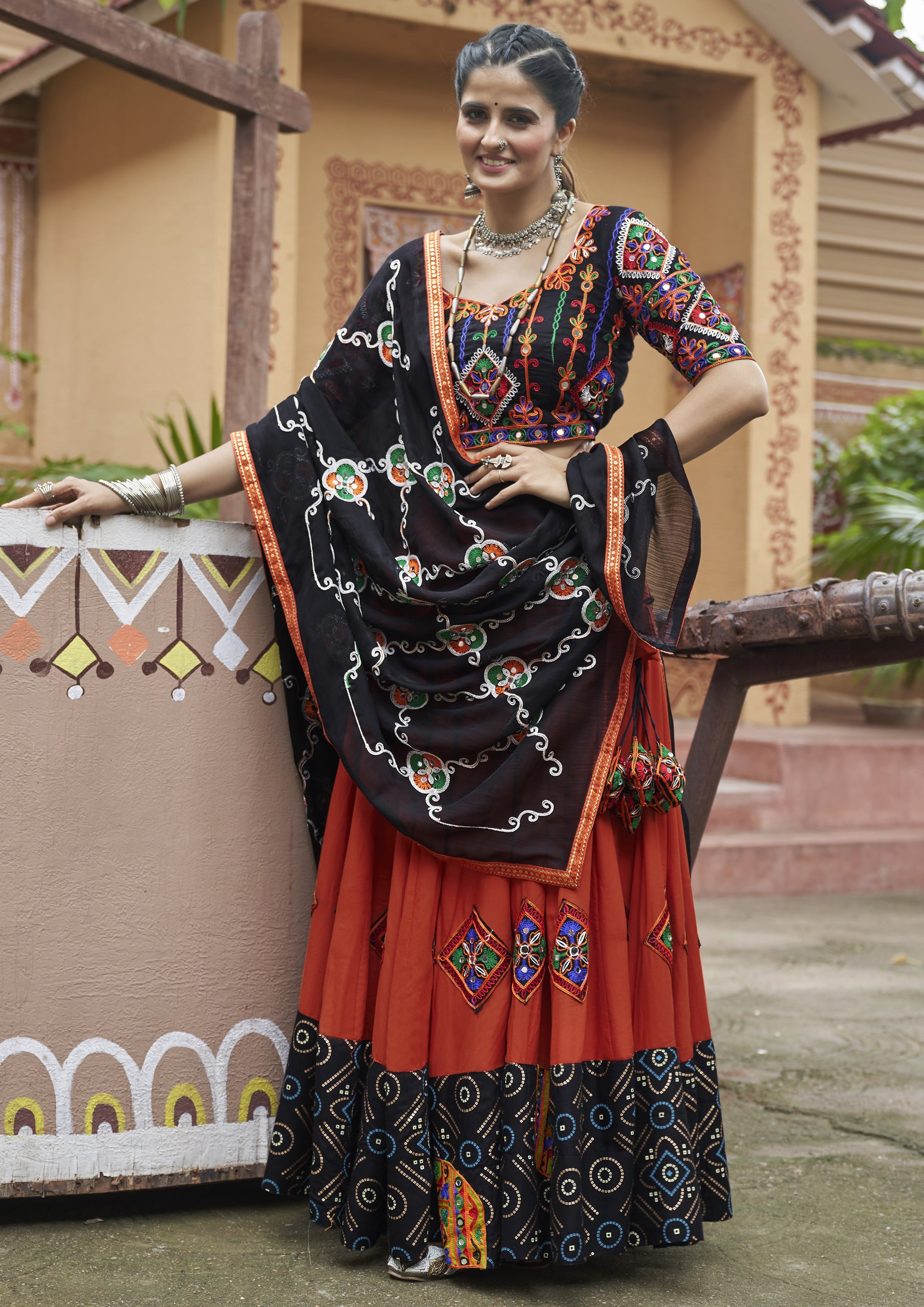 Orange Color Viscose Rayon Embroidered Garba Wear Lehenga