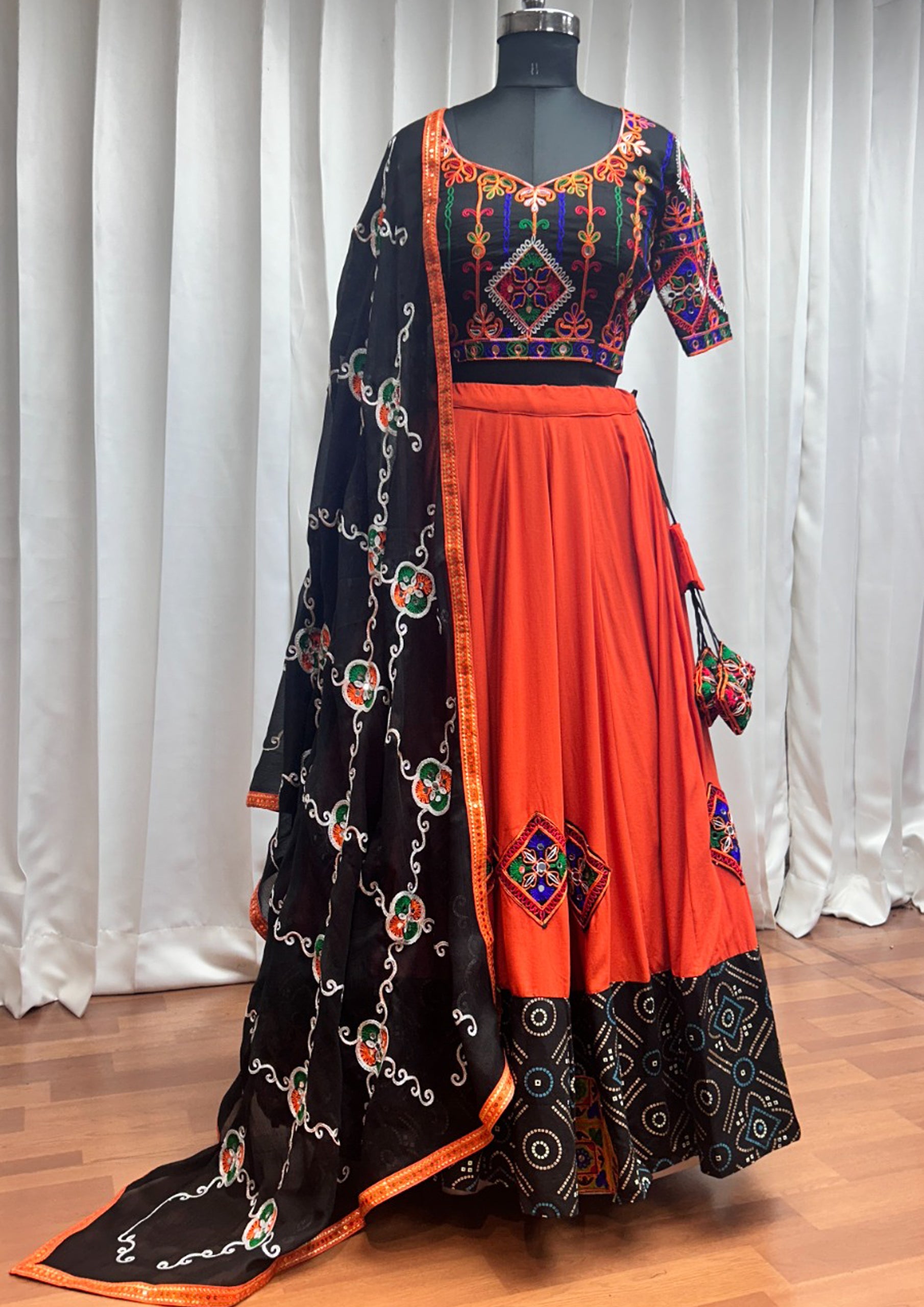 Orange Color Viscose Rayon Embroidered Garba Wear Lehenga