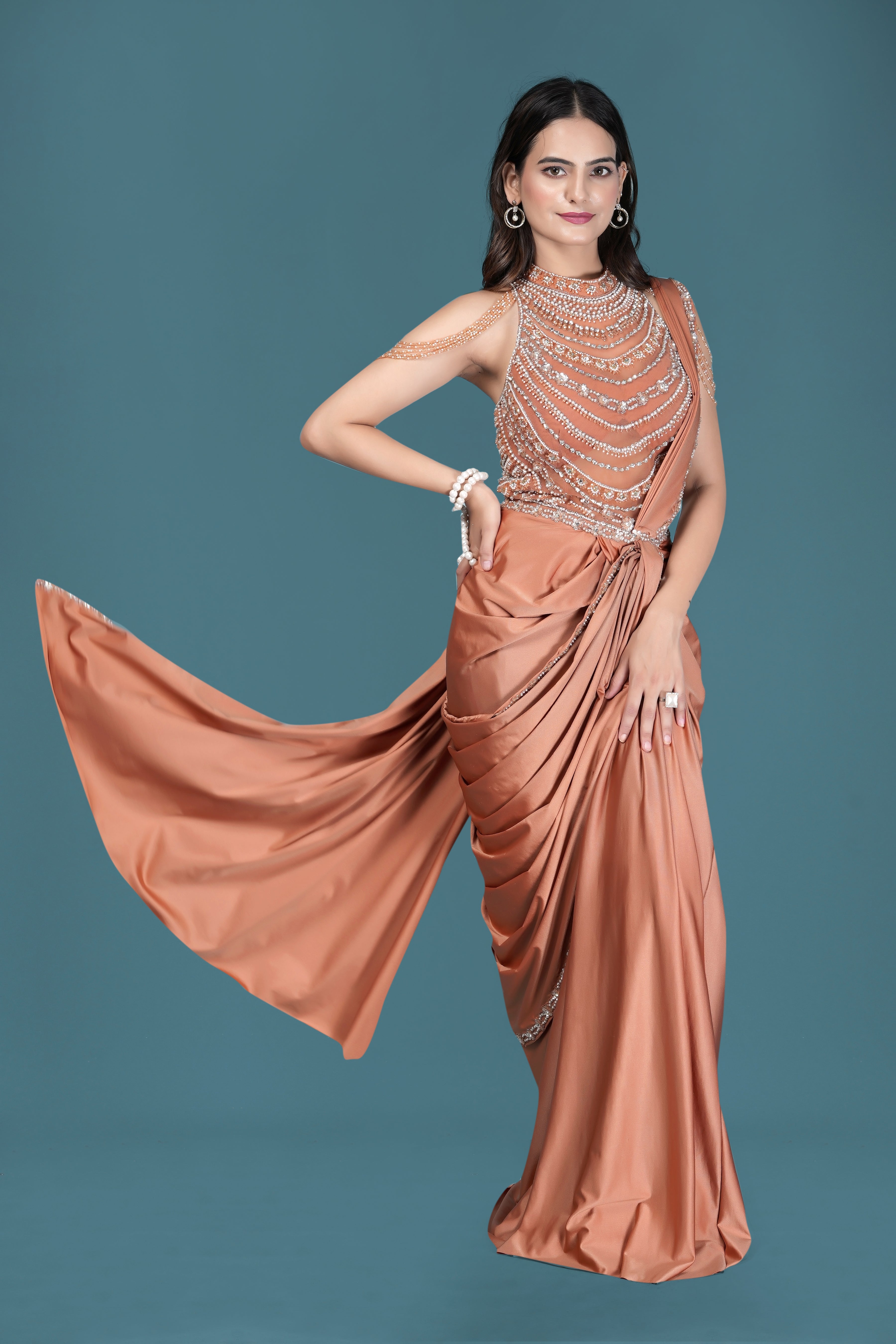 Pastel Peach Drape Saree with Crystal Embellished Designer Blouse