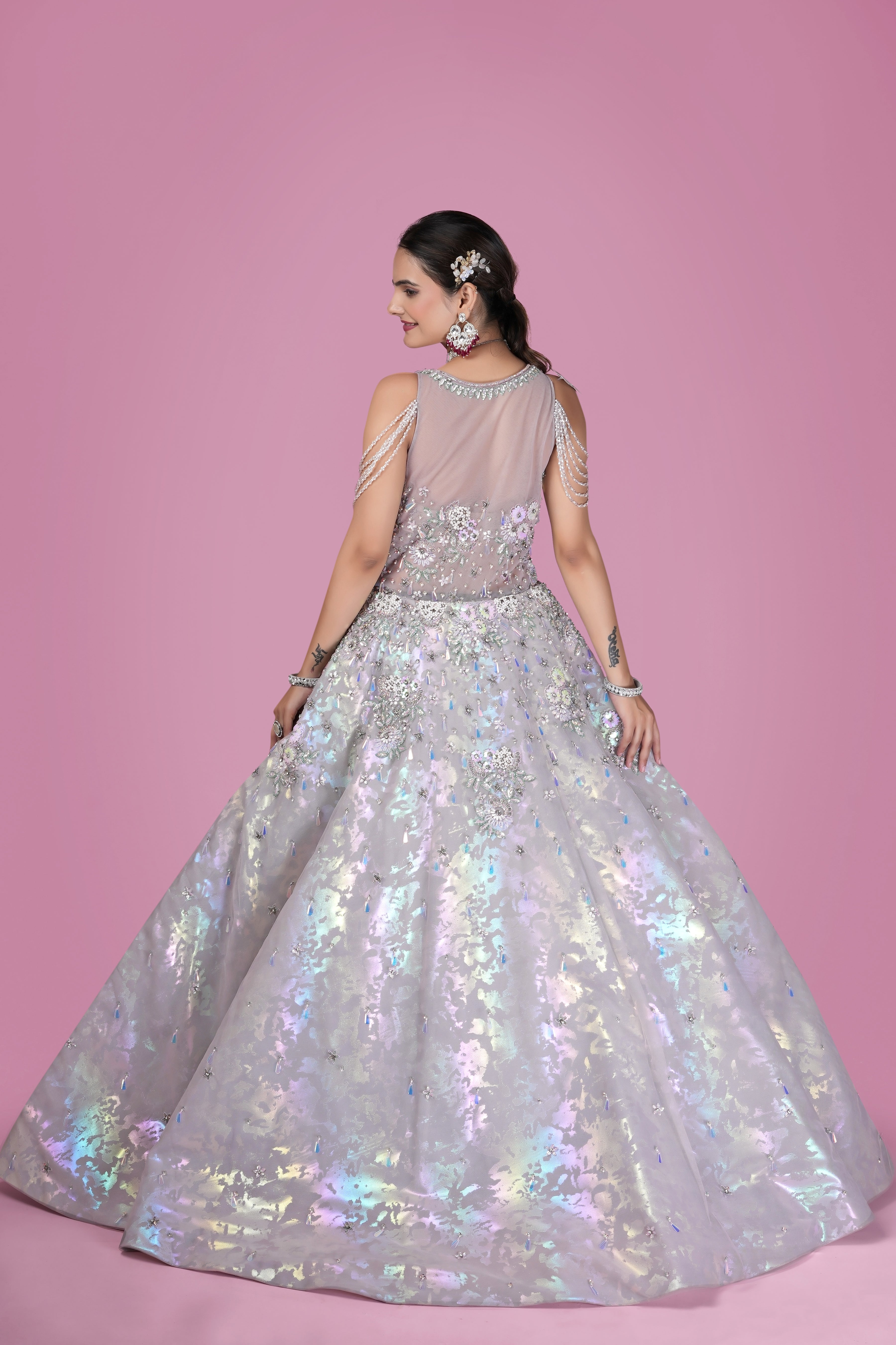 Iridescent Silver Ball Gown with Crystal Embellishments