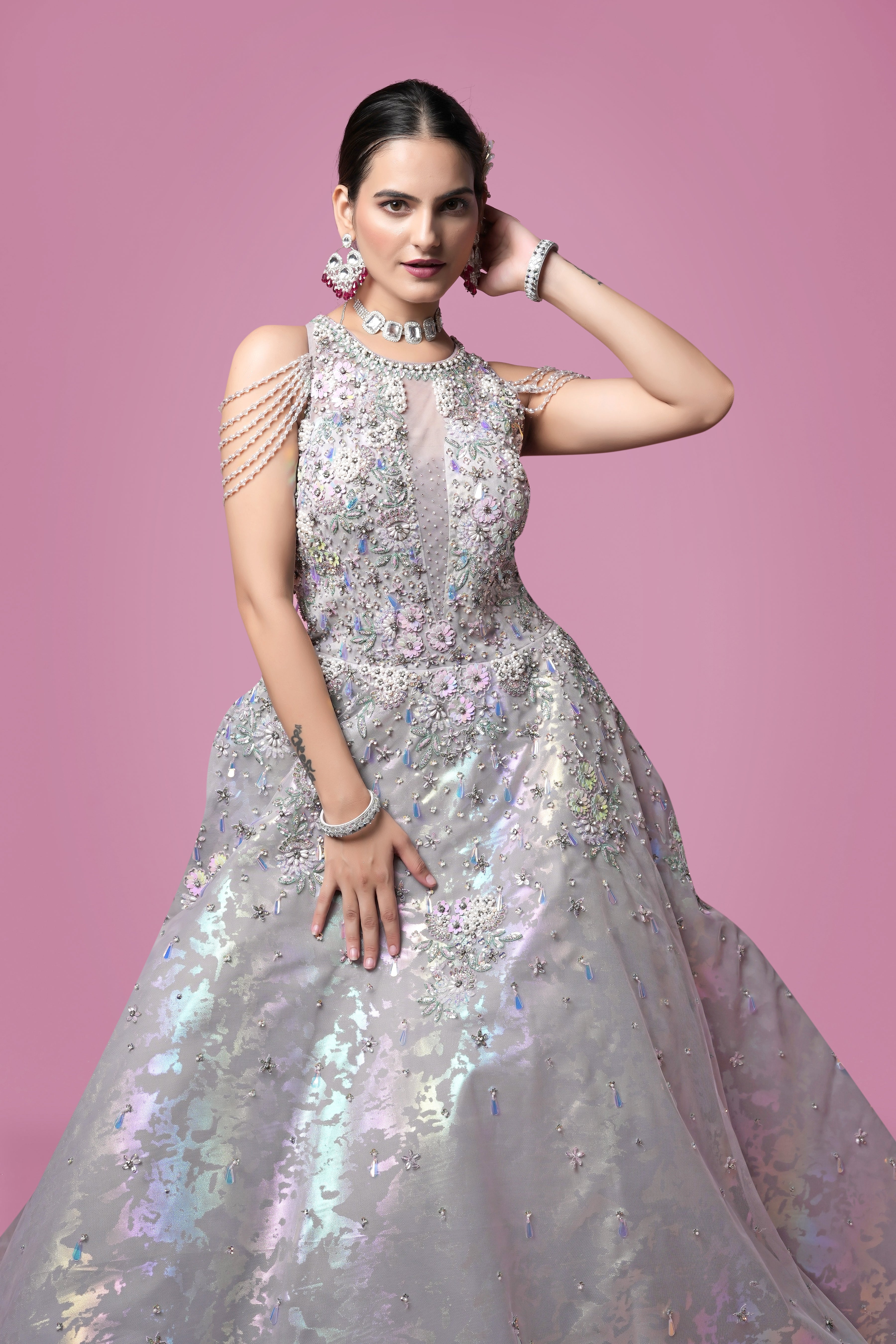 Iridescent Silver Ball Gown with Crystal Embellishments