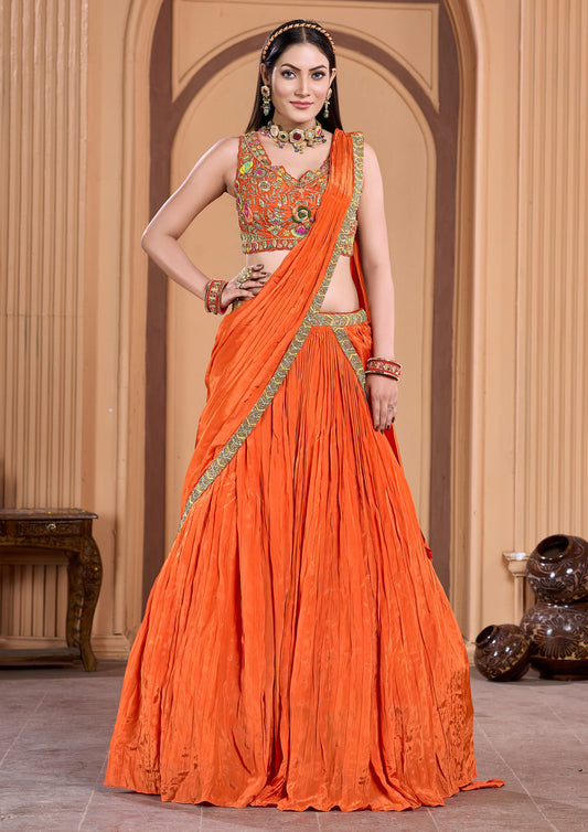 Woman from India dressed in bright orange sari, cultural outfit.