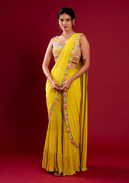 A stunning yellow georgette saree featuring exquisite hand work.