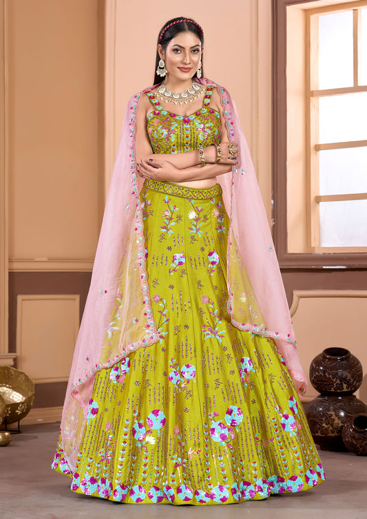 A stunning Indian woman wearing a green lehenga, showcasing the elegance of traditional attire.