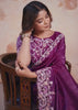  Elegant purple saree adorned with floral designs.